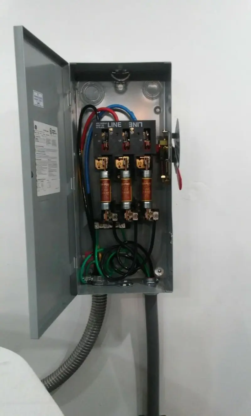 Three-phase disconnect switch installed for Smoke Detector Installation in Rib Mountain